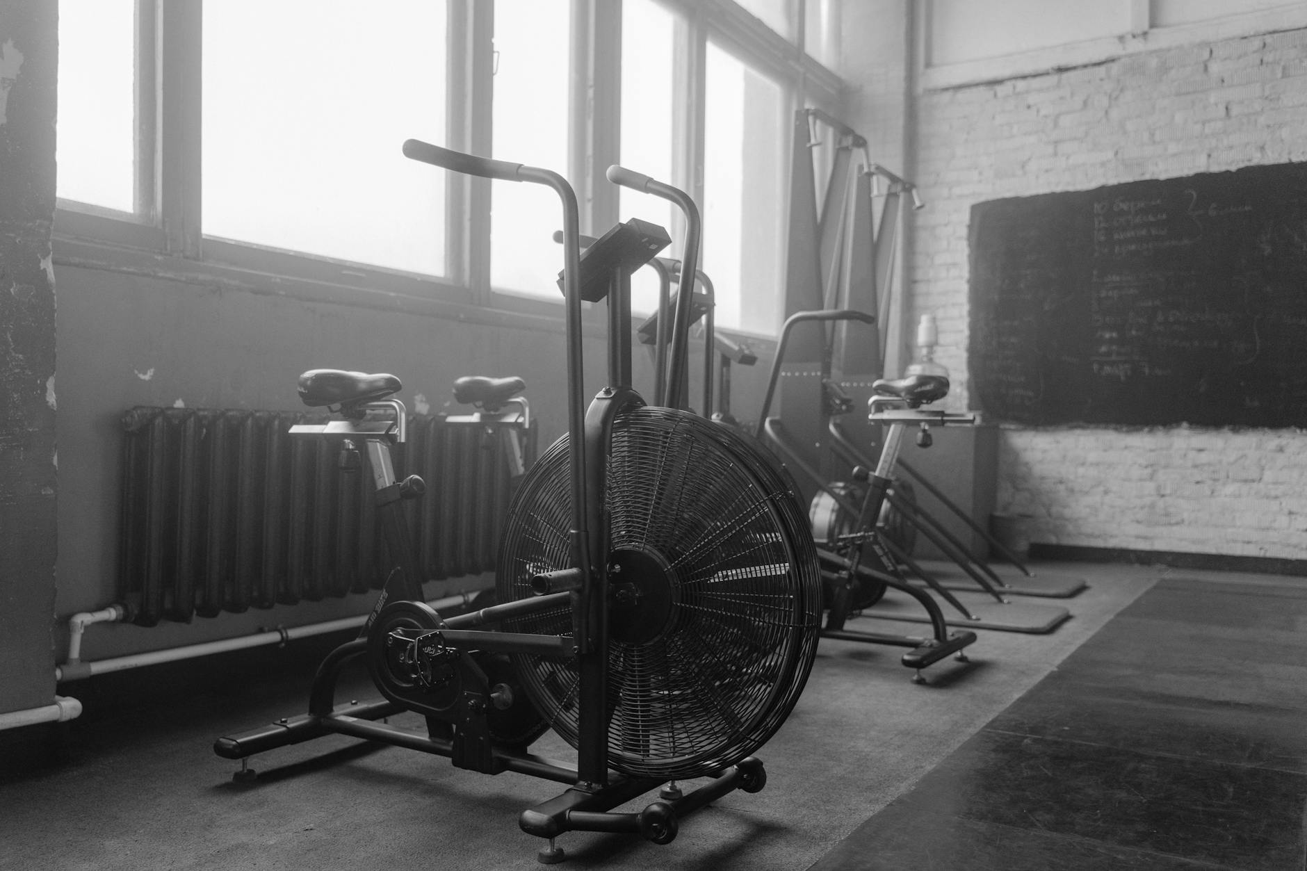 Gym interior with modern black fitness equipment